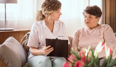 Young nurse prescribing the medication to an older woman in the nursing house
